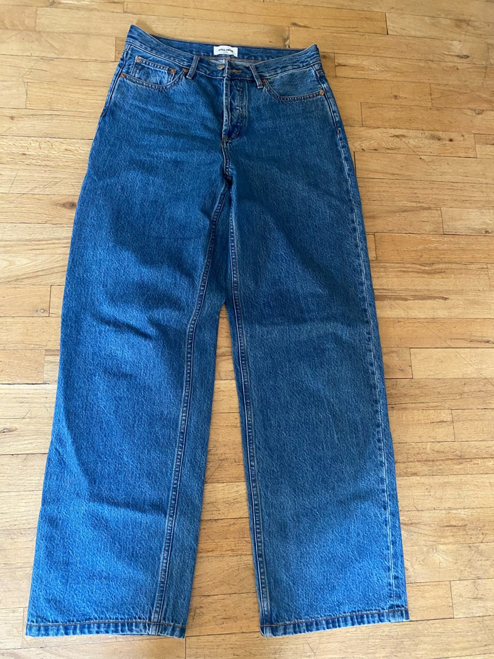 Still here great pair of jeans. Size 27. Inseam is about 31 inches.